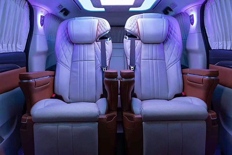 Electric VIP sofa seats in luxury vans are more effective when paired with ambient lights in the car